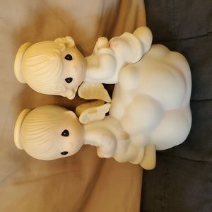 Precious Moments - But love goes on forever